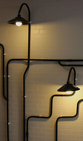Fotografia de una pared con focos decorativos